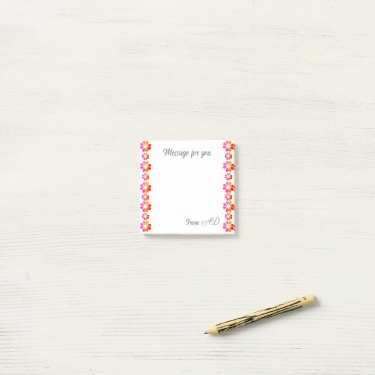 Oranje rode bloem post-it® notes (Op bureau)