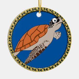 Oranje schildpad zwemmen met een gouden lijst keramisch ornament