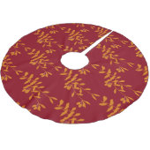 Oranje silhouetbladeren op rood kerstboom rok (Gekanteld)