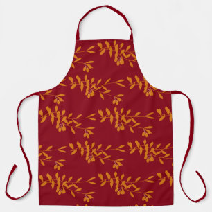 Oranje silhouetbladeren op rood schort