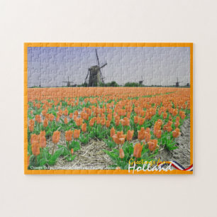 Oranje Tulpen en windmolens in het landschap Puzzl Legpuzzel