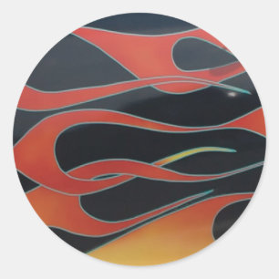 oranje vlammen op zwart ronde sticker