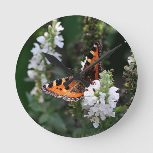 Oranje vlinder en witte bloesems ronde klok (Voorkant)