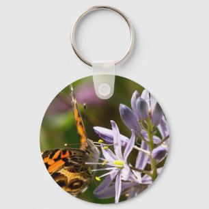Oranje vlinder op Wilde Hyacinth Apparel & Gifts Sleutelhanger