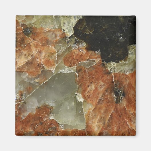 Oranje, zwart en helder kwartz magneet (Voorkant)