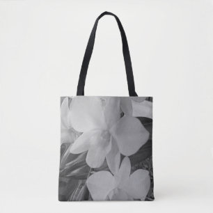 Orchidées en niveaux de gris sur sac fourre-tout