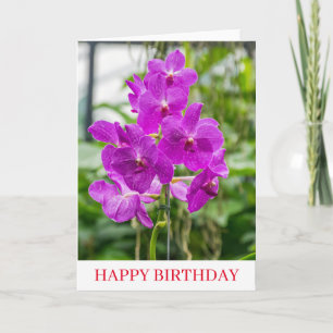 Orchidées près de la carte d'anniversaire