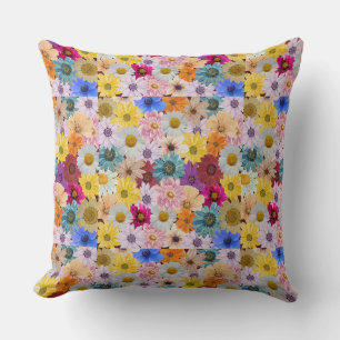 Oreiller à jet coloré à motif de marguerite