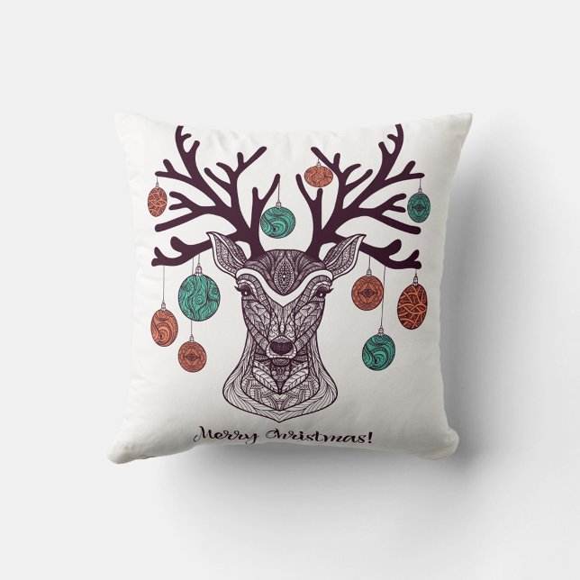 Oreiller à lancer de cerfs de Noël ( The words "Merry Christmas!" are written in a cursive font at the bottom of the pillow. )