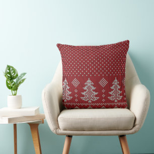 Oreiller de Noël avec arbres rouges et flocons de