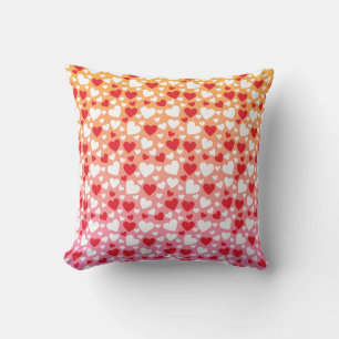 Oreiller jeté à motif de cœurs rouges et blancs