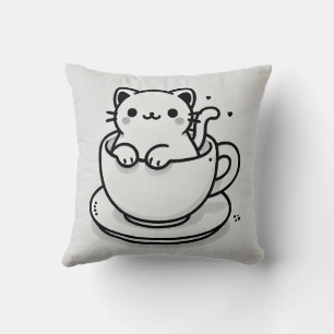 Oreiller jeté avec un chat mignon dans une tasse à
