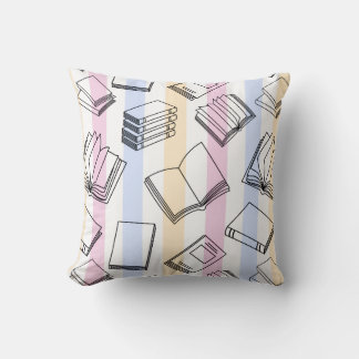 Oreiller jeté motif livre pastel