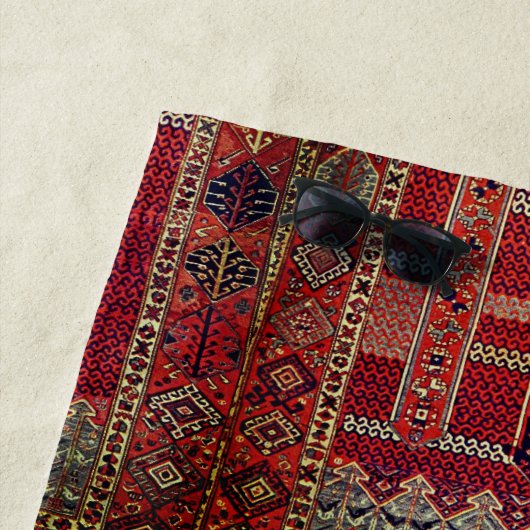 Orientaal tapeontwerp in diepe sinaasappels strandlaken (In situ)