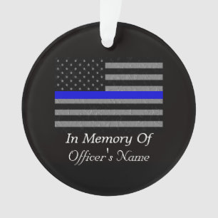 ORNEMENT À LA MÉMOIRE D'UN AGENT DE POLICE DÉCÉDÉ