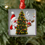 Ornement Carré Argenté Santa claus and reindeer behind a christmas tree.j<br><div class="desc">christmas santa claus reindeer,  frofrisend friends ful funny ,  vintage magic snowflake art,  2020 happy new year,  joy gift snow flying,  year new celebration deer,  happy xmas winter holiday,  bell merry cartoon illustration,  fun animal cute,  reindeer christmas clmas</div>