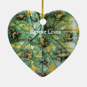 ORNEMENT CŒUR EN CÉRAMIQUE PETITS CHEVAUX SUR UNE FEUILLE VERTE