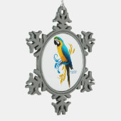 Ornement de flocon de neige bleu et or Macaw (Gauche)