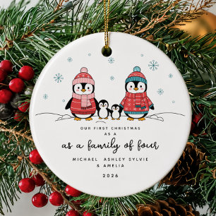 Ornement de Noël de la famille pingouin en premier