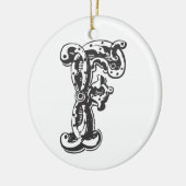 Ornement décoré d'un monogramme de Noël de la (Gauche)