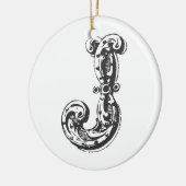 Ornement décoré d'un monogramme de Noël de la (Gauche)