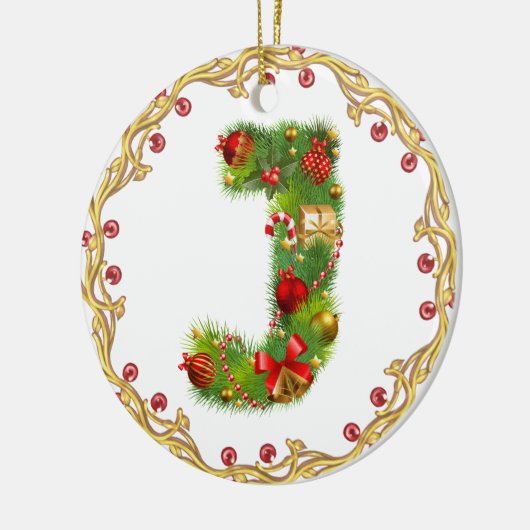 ornement décoré d'un monogramme initial de Noël de (Gauche)