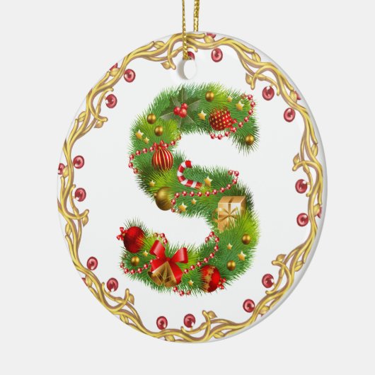 ornement décoré d'un monogramme initial de Noël de (Gauche)