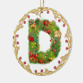 ornement décoré d'un monogramme initial de Noël de (Gauche)