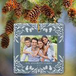 Ornement En Céramique 2 Photos Famille Végétation d'hiver Bleu Noël<br><div class="desc">Ce décor de Noël bleu foncé présente une élégante illustration de verdure d'hiver blanche qui encadre les photos. Le design offre de l'espace pour 2 photos,  l'une à l'avant et l'autre à l'arrière. Personnalisez ce joli ornement de conservation avec votre nom de famille et l'année.</div>
