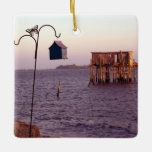 Ornement En Céramique Cedar Key Bird Feeder<br><div class="desc">A quaint bird feeder on the shore near a delapidated fish cabin in Cedar Key,  Florida. See my other work at https://www.pinterest.com/waycoolerdesigns/boards!</div>