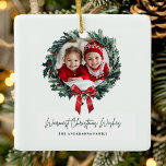 Ornement En Céramique Couronne de Noël personnalisée avec photo et nom<br><div class="desc">Célébrez les souvenirs qui vous sont chers avec cet Ornement de couronne de Noël personnalisé, avec votre photo et votre nom encerclés par une couronne de fête. Parfait pour orner votre sapin de Noël ou pour donner à ceux qui vous sont chers, cet ornement personnalisé est une belle façon de...</div>
