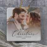 Ornement En Céramique Delicate First Christmas Couples Keepsake Photo<br><div class="desc">This delicate first Christmas couples keepsake photo ceramic ornament is the perfect modern Christmas tree decoration. The romantic minimalist design features lovely and elegant black typography with a clean and simple look. Personalize your double-sided keepsake ornament with a photo,  your names and the year.</div>