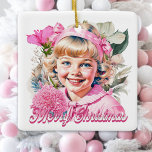 Ornement En Céramique Fille rose vintage Joyeux Noël<br><div class="desc">Jolie petite fille blanche et rose souriant avec des fleurs tasse de Noël.</div>