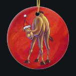 Ornement En Céramique Joli Noël Camel En Rouge<br><div class="desc">Animal Parade Festive Camel à Santa Hat sur Red Christmas Gifts and Decorations présente notre oeuvre amusante d'un mignon chameau brun tan décoré dans un chapeau de Père Noël contre un arrière - plan rouge texturé numériquement peint par notre talentueux illustrateur pour enfants, Traci Van Wagoner. Sur le dos de...</div>