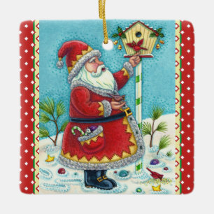 ORNEMENT EN CÉRAMIQUE KRIS KRINGLE ALIMENTER LES OISEAUX REDBIRÉS, NOËL