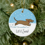 Ornement En Céramique Laisser la neige Dachshund - Happy Winter Wiener D<br><div class="desc">Un dessin animé festif d'un heureux Dachshund qui traverse la neige tombée. Ce joli ornement de Noël Wiener Dog en céramique fait un cadeau sucré et un souvenir précieux à afficher sur l'arbre de Noël pour les années à venir. Visitez le Doodle World de Jenn pour encore plus de cadeaux...</div>