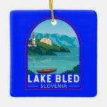 Ornement En Céramique Lake Bled Slovénie Travel Retro Art Vintage<br><div class="desc">Design vectoriel de Lake Bled. Le lac Bled est un lac situé dans les Alpes Juliennes de la région du Haut Carniolan,  au nord-ouest de la Slovénie,  où il jouxte la ville de Bled.</div>