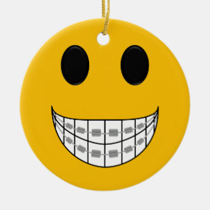 Ornement En Céramique Le dentiste attache l'ornement