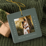 Ornement En Céramique Minimal Modern Engaged & Merry 2 Photo Engagement<br><div class="desc">Minimal and modern simple photo keepsake photo ornament to commemorate your first Christmas engaged. The design features a simple minimal design with a square photo design to display your special engagement photo. "Engaged & Merry", year and couple's name displayed in a simple modern design around the photo. Two photo ornament...</div>