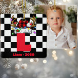 Ornement En Céramique Monogramme Personnalisé Avec Nom Famille Noël<br><div class="desc">Ajoutez une touche d'élégance personnalisée à votre décor de vacances avec le Monogramme Personnalisé Avec Nom Famille Rouge et Noir Ornement en Céramique de Noël. Ce décor magnifiquement conçu est doté d'un alphabet monogramme classique, ce qui en fait un ajout intemporel à vos décorations festives. Le riche jeu de couleurs...</div>