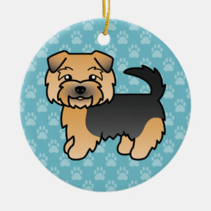Ornement En Céramique Norfolk Terrier noir et feu sur fond bleu