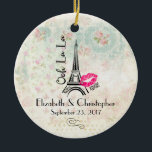 Ornement En Céramique Ooh La Paris Mariage Tour Eiffel<br><div class="desc">Un ornement mariage personnalisé avec un joli arrière - plan motif vintage avec des roses et d'autres éléments décoratifs. La partie supérieure est une illustration de la tour eiffel et des trottoirs écrits par Ooh La La. Une impression de rouge à lèvres rose chaud laissée à côté du célèbre repère...</div>