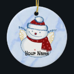 Ornement en céramique ovale Snowman Angel<br><div class="desc">Ornement en céramique ovale Snowman Angel,  t-shirts et cadeaux de ArtMuvz Illustration. Correspondant Chandail Funny Snowmen,  classeur,  mug,  ornement. Pour personnaliser,  ajoutez votre nom ou ajoutez du texte à la place. Customisez ce ornement de bonhomme de neige pour le rendre unique à vous ou pour donner en cadeau personnalisé</div>