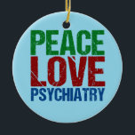 Ornement En Céramique Peace Love Psychiatry<br><div class="desc">Un joli cadeau de Noël psychiatre avec des lettres vertes,  rouges et bleues qui lisent Peace Love Psychiatry. Un grand cadeau pour un étudiant diplômé avec un diplôme psychiatrique.</div>