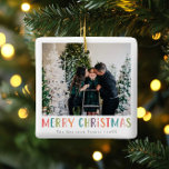 Ornement En Céramique Photo de famille de Noël moderne et colorée<br><div class="desc">Cette décoration familiale simple et amusante de Joyeux Noël vous permet d'ajouter vos noms,  avec "Joyeux Noël" en typographie colorée et brillante,  ainsi que de vous permettre d'ajouter votre propre photo. Sur le dos est un pois coloré assorti. Un décor de vacances moderne pour votre famille cet hiver !</div>