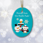 Ornement En Céramique Pôle Nord Penguin Snowman Enfants Noël<br><div class="desc">Tout droit du pôle Nord, un bonhomme de neige et de pingouin caricaturiste apportent des voeux de vacances à votre enfant ! Ils se tiennent devant un poteau rayé rouge et blanc avec une pancarte qui dit pôle Nord. Les images sont placées sur un arrière - plan bleu ciel brillant....</div>