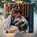 Ornement En Céramique Premier marié Noël deux photo simple marine<br><div class="desc">Cet ornement moderne de Noël simple présente un bord bleu marine ondulé tendance ainsi qu'une grande photo et une pièce pour le texte personnalisé et l'année. Conçu pour un nouvel ornement célébrant un premier Noël ensemble, cet ornement comporte une grande photo sur le devant et une seconde sur le dos...</div>