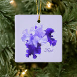 Ornement En Céramique Romantic Purple Flag Iris Customized<br><div class="desc">This design features a romantic purple flag iris with your name or other message against a pale purple background. Type the information you want in the Personalized section, such as a name, initials, or year. I love the near luminescence and diverse textures and shapes in iris blooms. The purple falls...</div>
