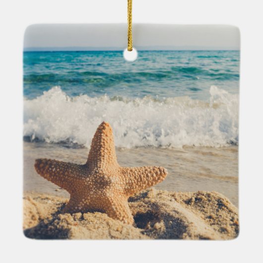 Ornement En Céramique Starfish sur une plage de sable Photo (Dos)
