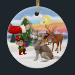 Ornement En Céramique Treat for a Siberian Husky (rouge)<br><div class="desc">Père Noël offre un régal à son Husky sibérien rouge alors que les elfes chargent le traîneau avant la grande nuit.</div>